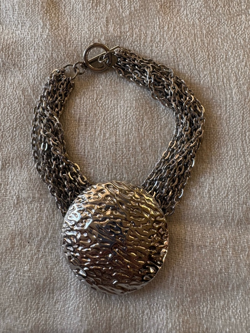 Silver Multi-Chain Statement Bracelet with Textured Disc